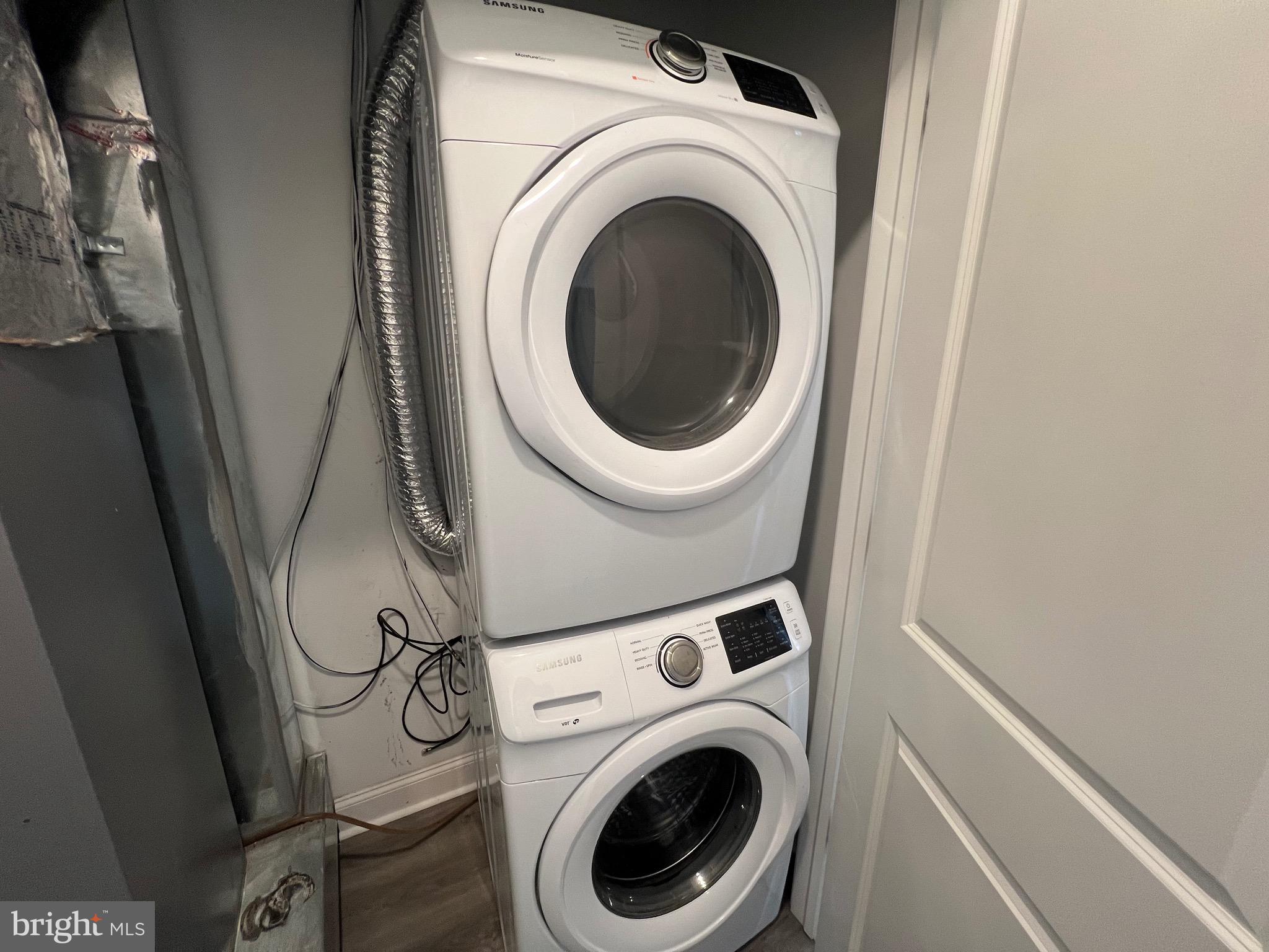 1829 North 33rd Street, Unit 4 Philadelphia, PA 19121 - Photo 8 of 10 a close up view of a washer and dryer