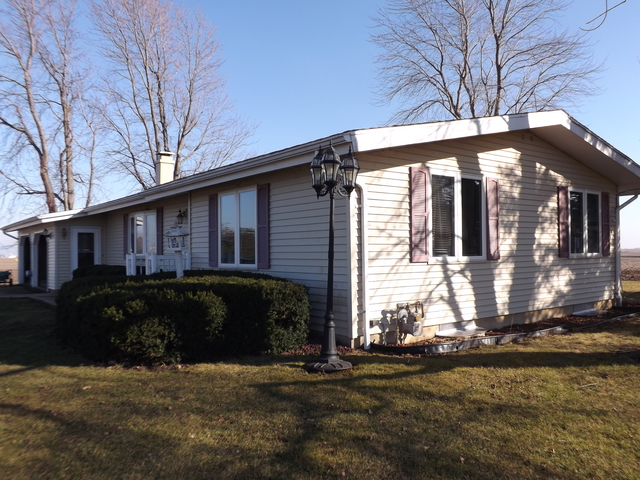 2760 North 3350th Road Marseilles, IL 61341 - Photo 21 of 24 a front view of a house with a yard