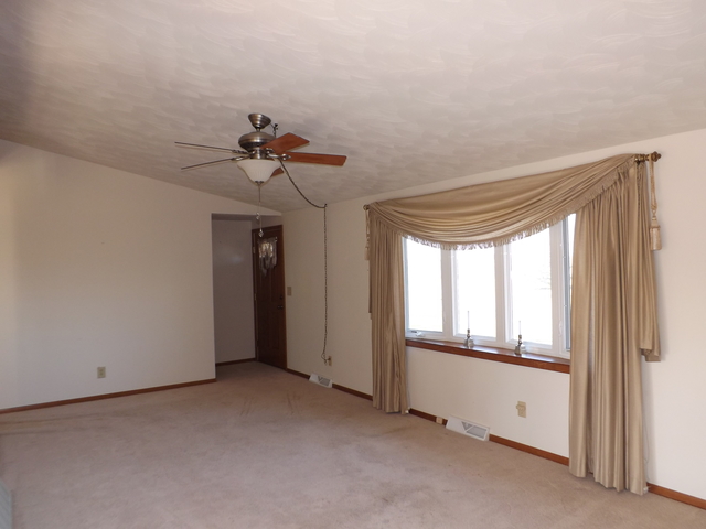 2760 North 3350th Road Marseilles, IL 61341 - Photo 7 of 24 a view of an empty room with a window