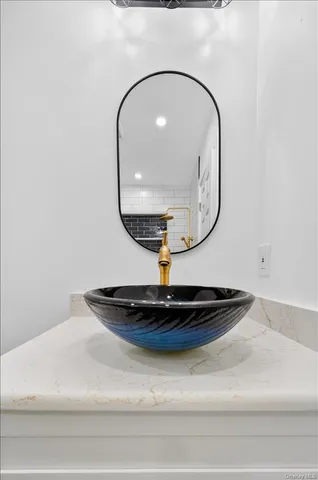 a vase of flowerpot sitting on a dining table