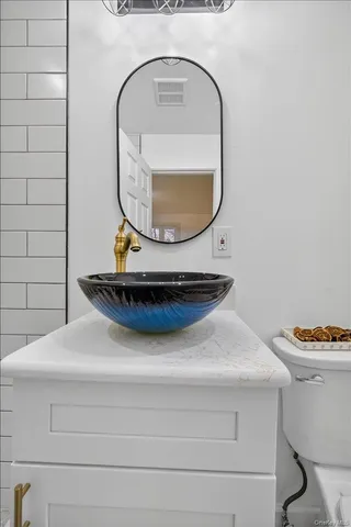 a view of a glass door with a balcony