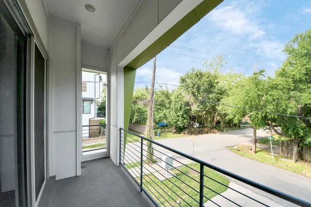 a view of a porch and backyard