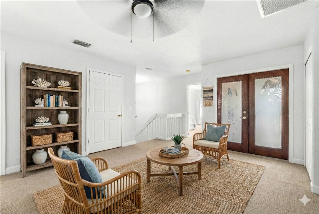 909 Bahia Mar Road Vero Beach, FL 32963 - Photo 16 of 36 a living room with furniture and a window