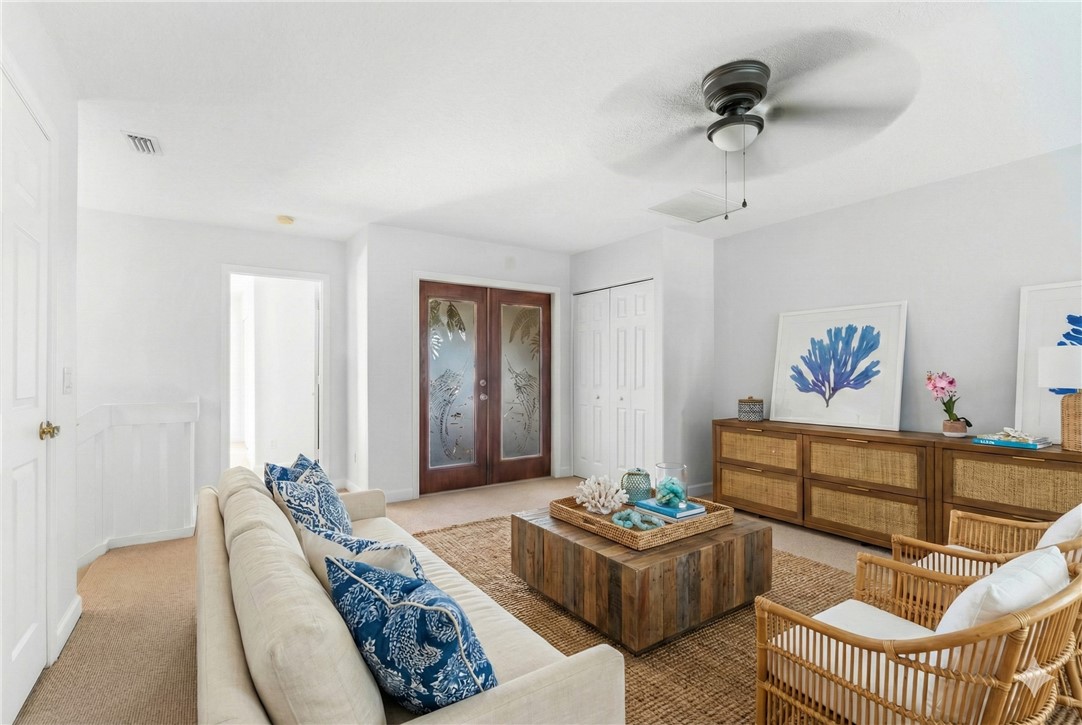 909 Bahia Mar Road Vero Beach, FL 32963 - Photo 18 of 36 a living room with furniture and a window