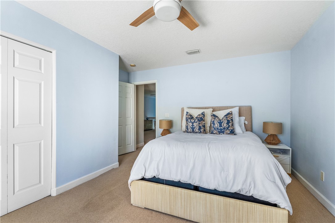 909 Bahia Mar Road Vero Beach, FL 32963 - Photo 21 of 36 a bedroom with a bed and window