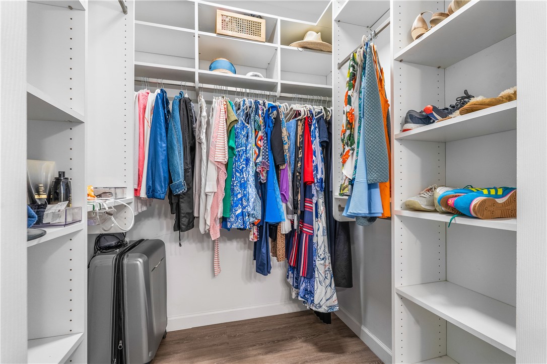 909 Bahia Mar Road Vero Beach, FL 32963 - Photo 22 of 36 a view of walk in closet with clothes and shoes