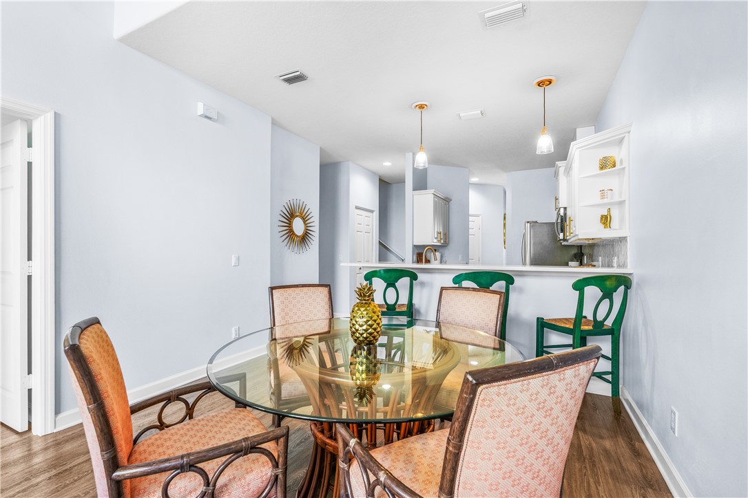 909 Bahia Mar Road Vero Beach, FL 32963 - Photo 10 of 36 a view of a dining room with furniture