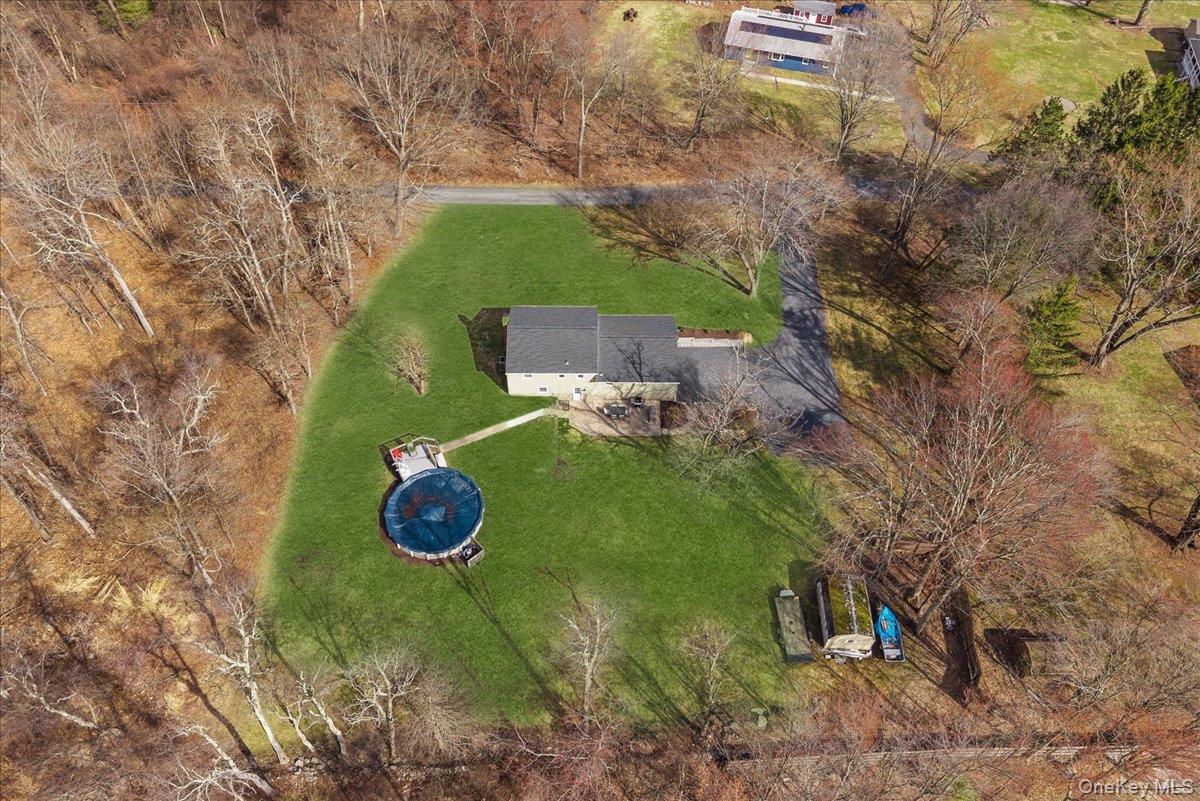 155 Mill Street Wallkill, NY 12589 - Photo 25 of 26 a backyard of a house with lots of green space