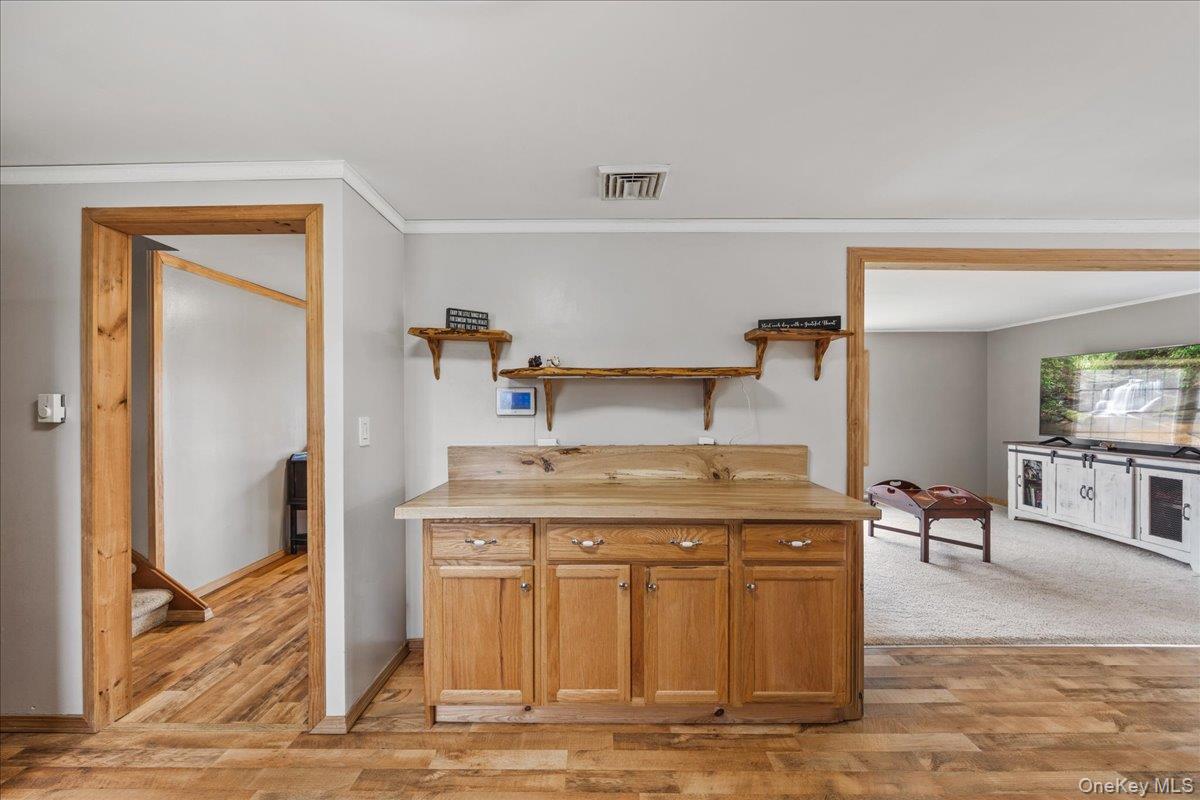 155 Mill Street Wallkill, NY 12589 - Photo 8 of 26 a room with a sink and a wooden floor