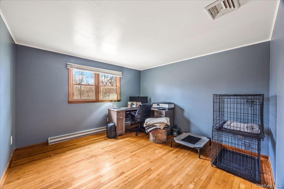155 Mill Street Wallkill, NY 12589 - Photo 10 of 26 a view of a workspace with furniture and a window