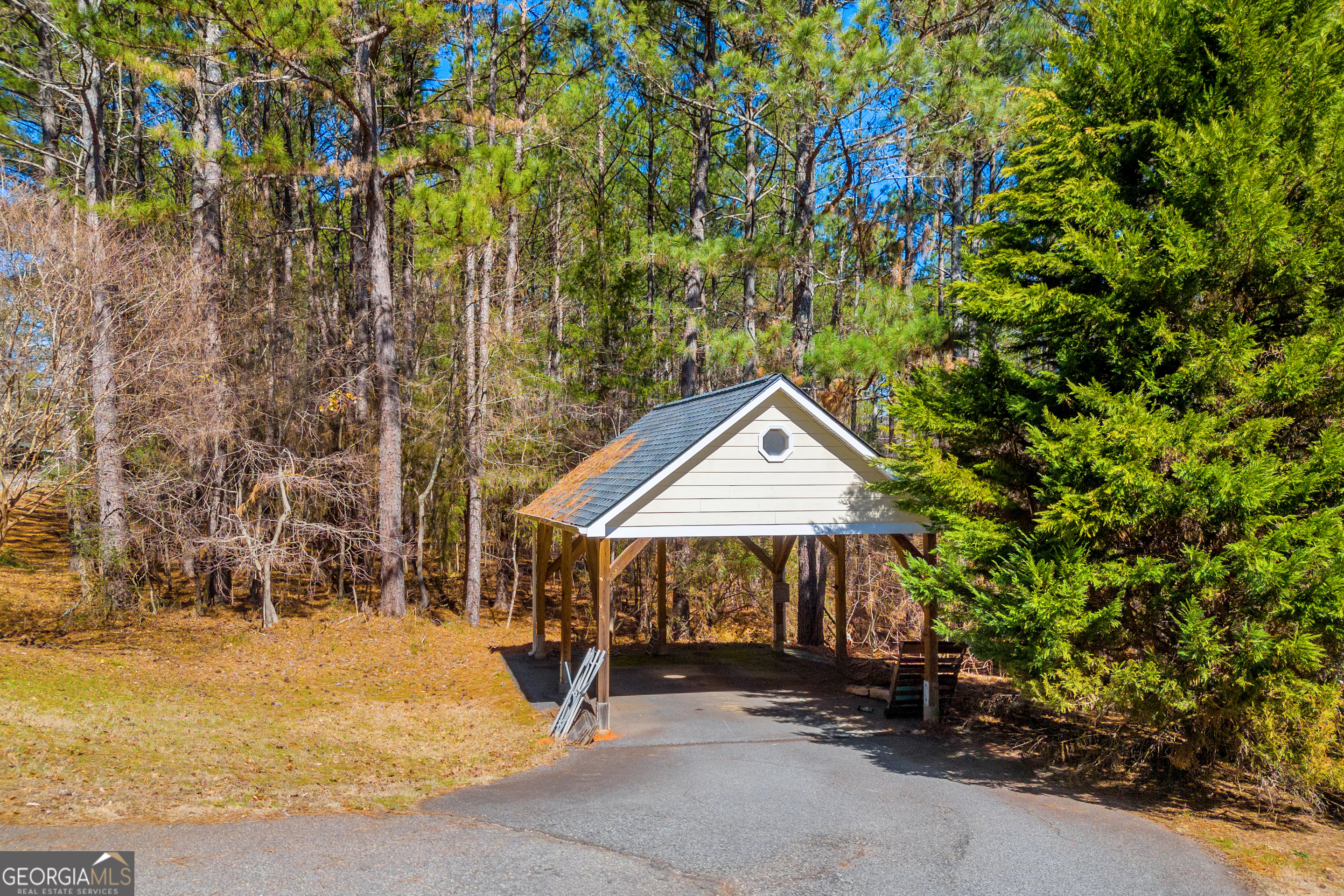 599 Double Branch Road Danielsville, GA 30633 - Photo 105 of 158 a front view of a house with a yard