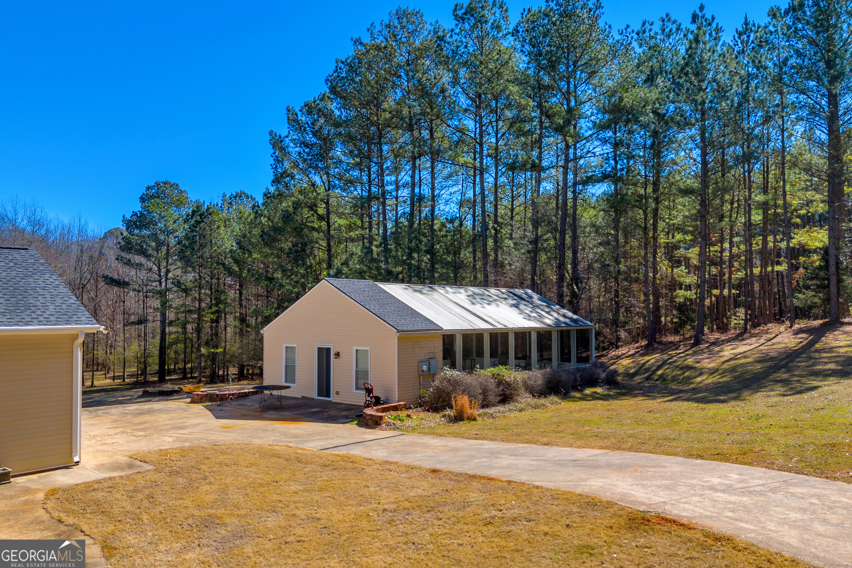 599 Double Branch Road Danielsville, GA 30633 - Photo 119 of 158 a front view of a house with yard and trees