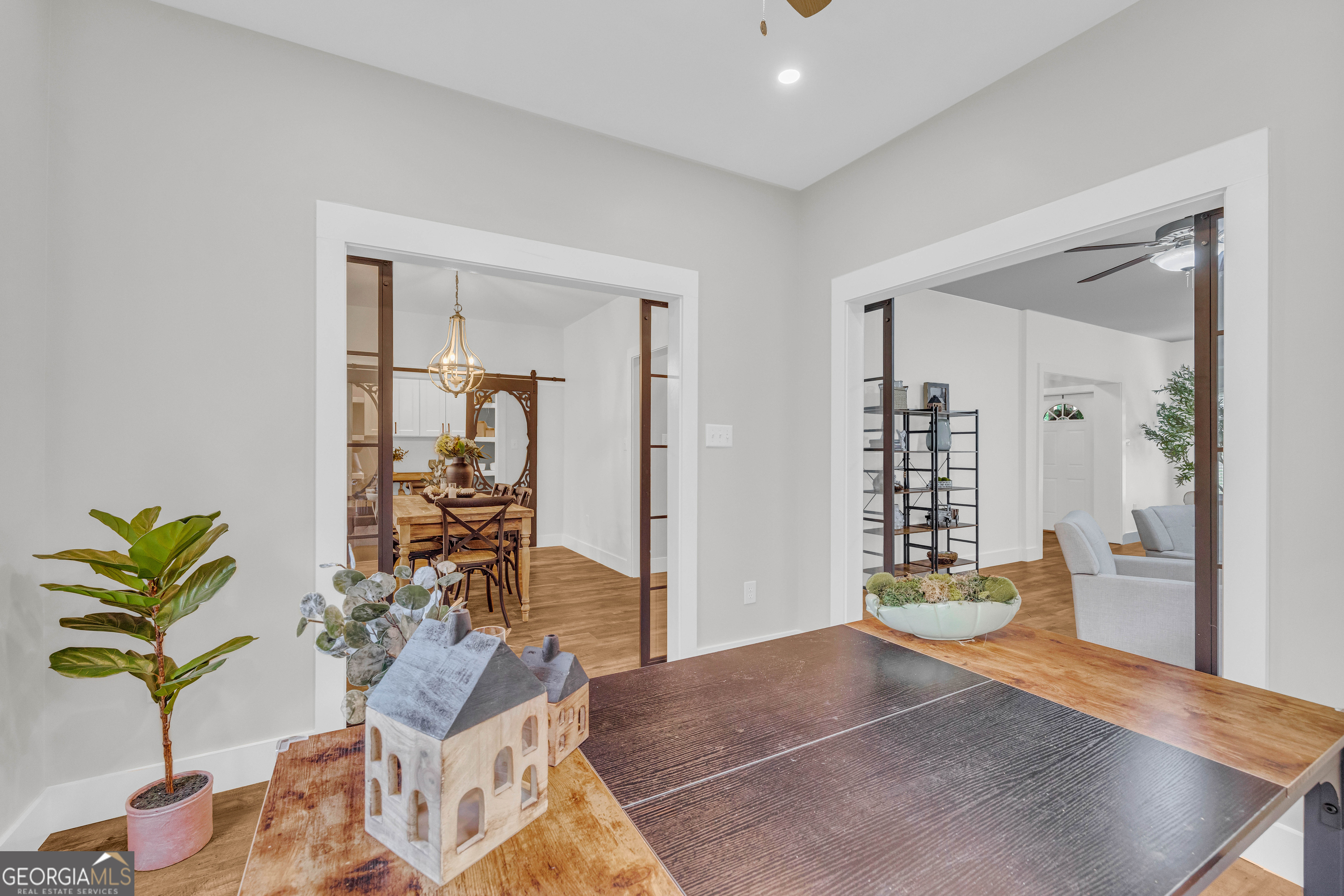 599 Double Branch Road Danielsville, GA 30633 - Photo 140 of 158 a living room with furniture and a potted plant
