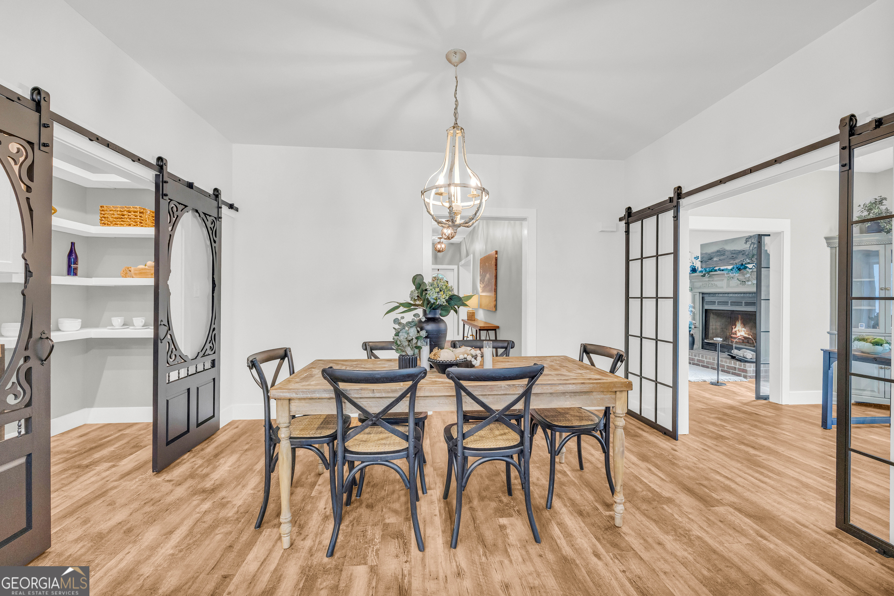 599 Double Branch Road Danielsville, GA 30633 - Photo 15 of 158 a dining room with furniture and wooden floor