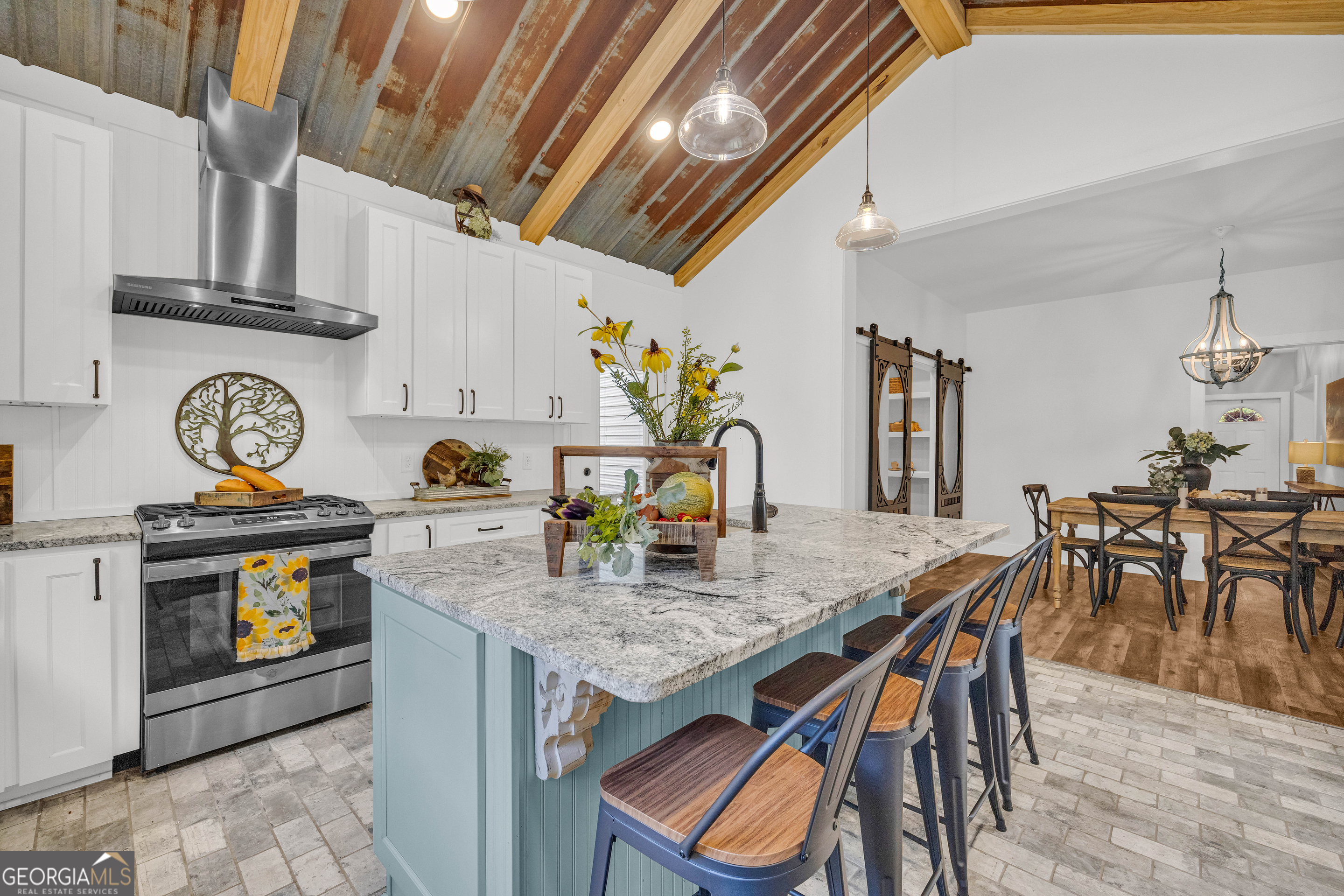 599 Double Branch Road Danielsville, GA 30633 - Photo 22 of 158 a table and chairs in a kitchen