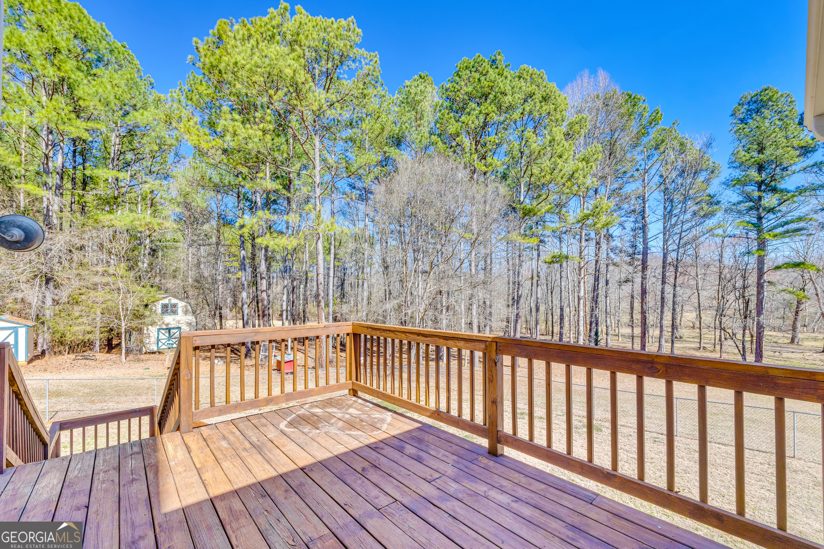 599 Double Branch Road Danielsville, GA 30633 - Photo 33 of 158 a view of balcony with wooden floor and outdoor seating