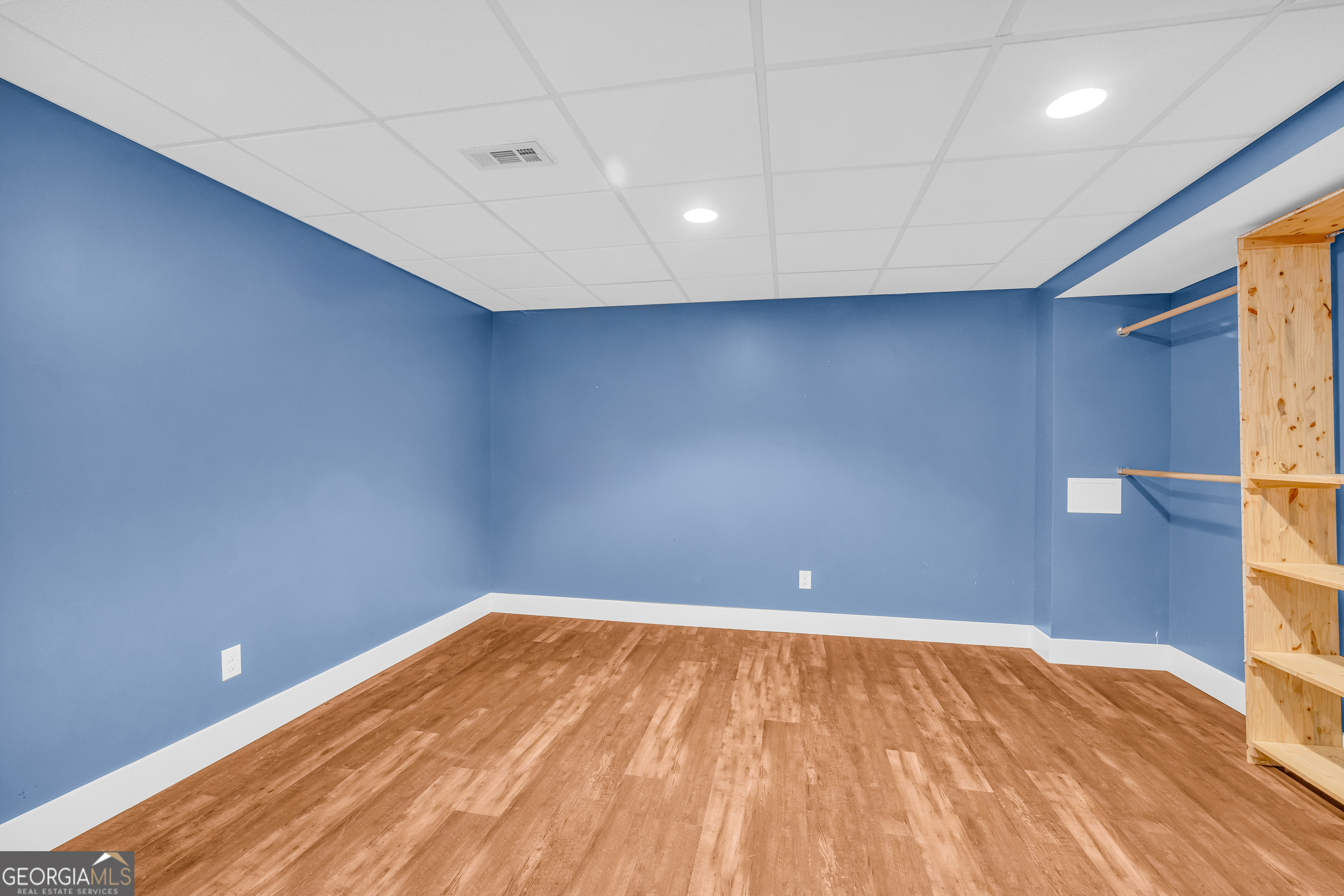 599 Double Branch Road Danielsville, GA 30633 - Photo 60 of 158 a view of empty room with wooden floor