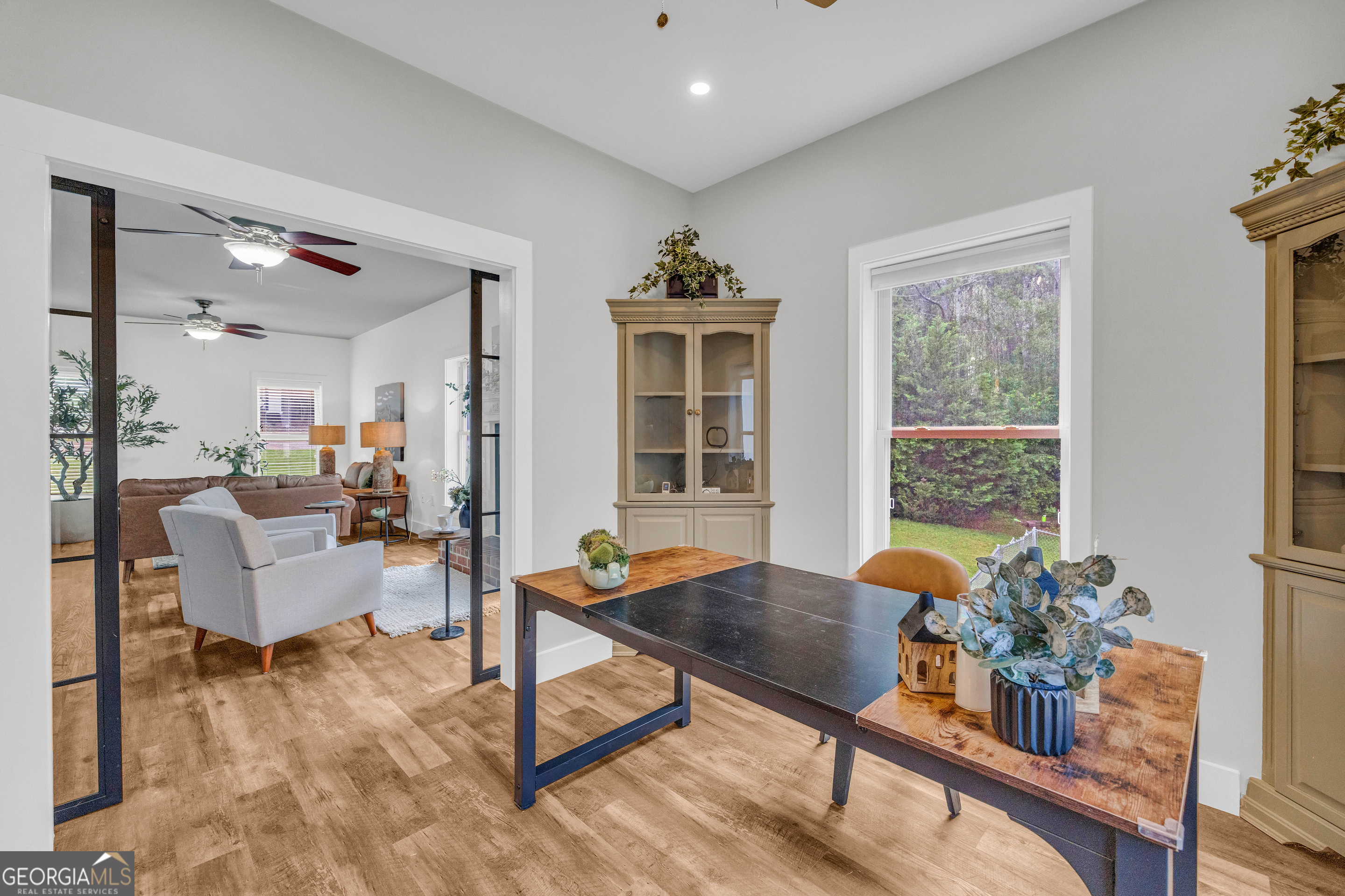 599 Double Branch Road Danielsville, GA 30633 - Photo 9 of 158 a living room with furniture and a window