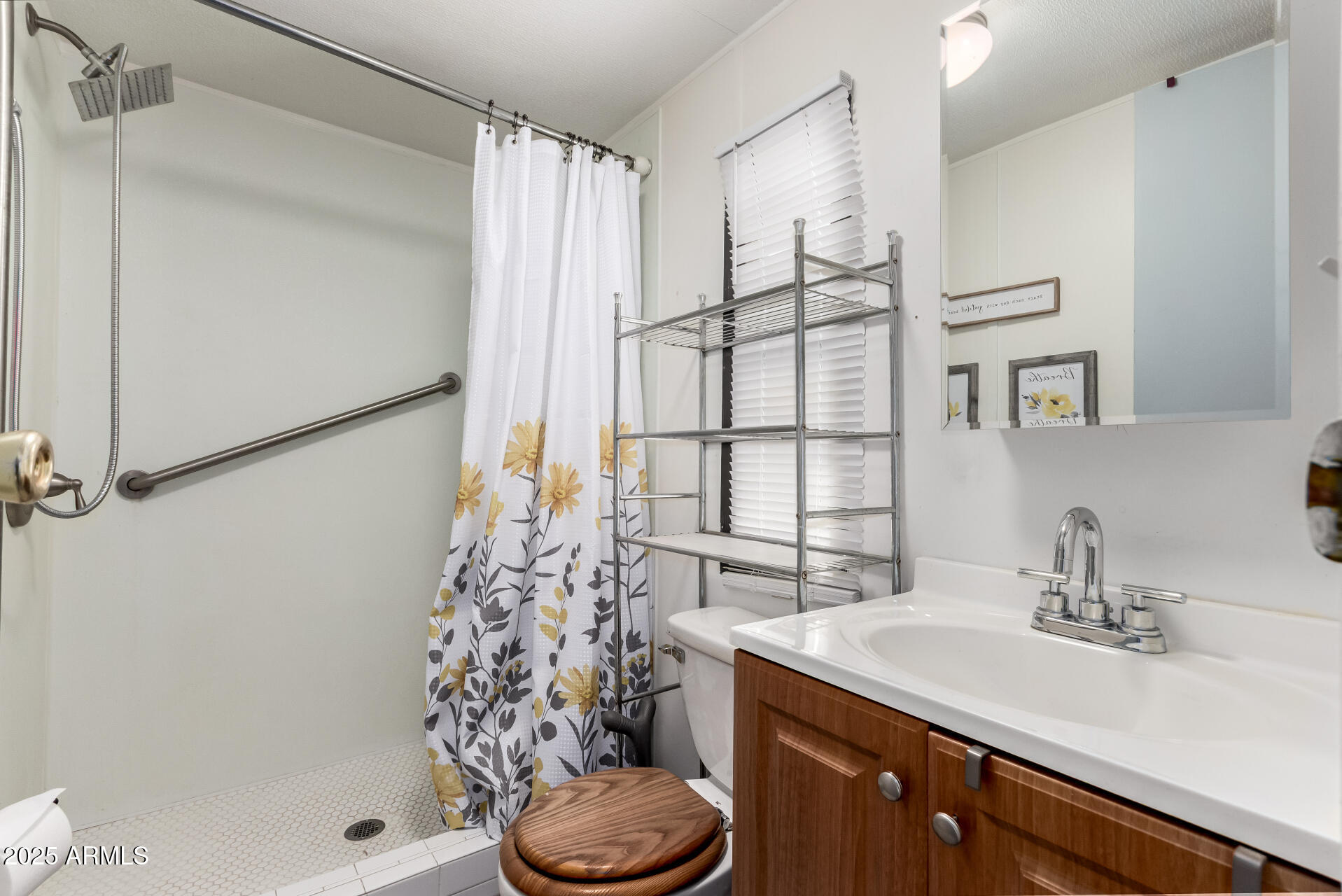 10401 North Cave Creek Road, Unit 93 Phoenix, AZ 85020 - Photo 22 of 28 a bathroom with a sink toilet and shower