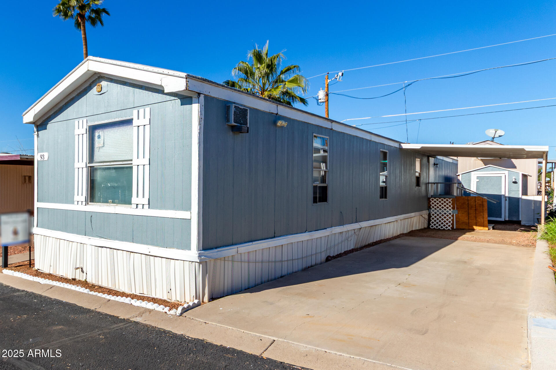 10401 North Cave Creek Road, Unit 93 Phoenix, AZ 85020 - Photo 26 of 28 a front view of a house with a garage