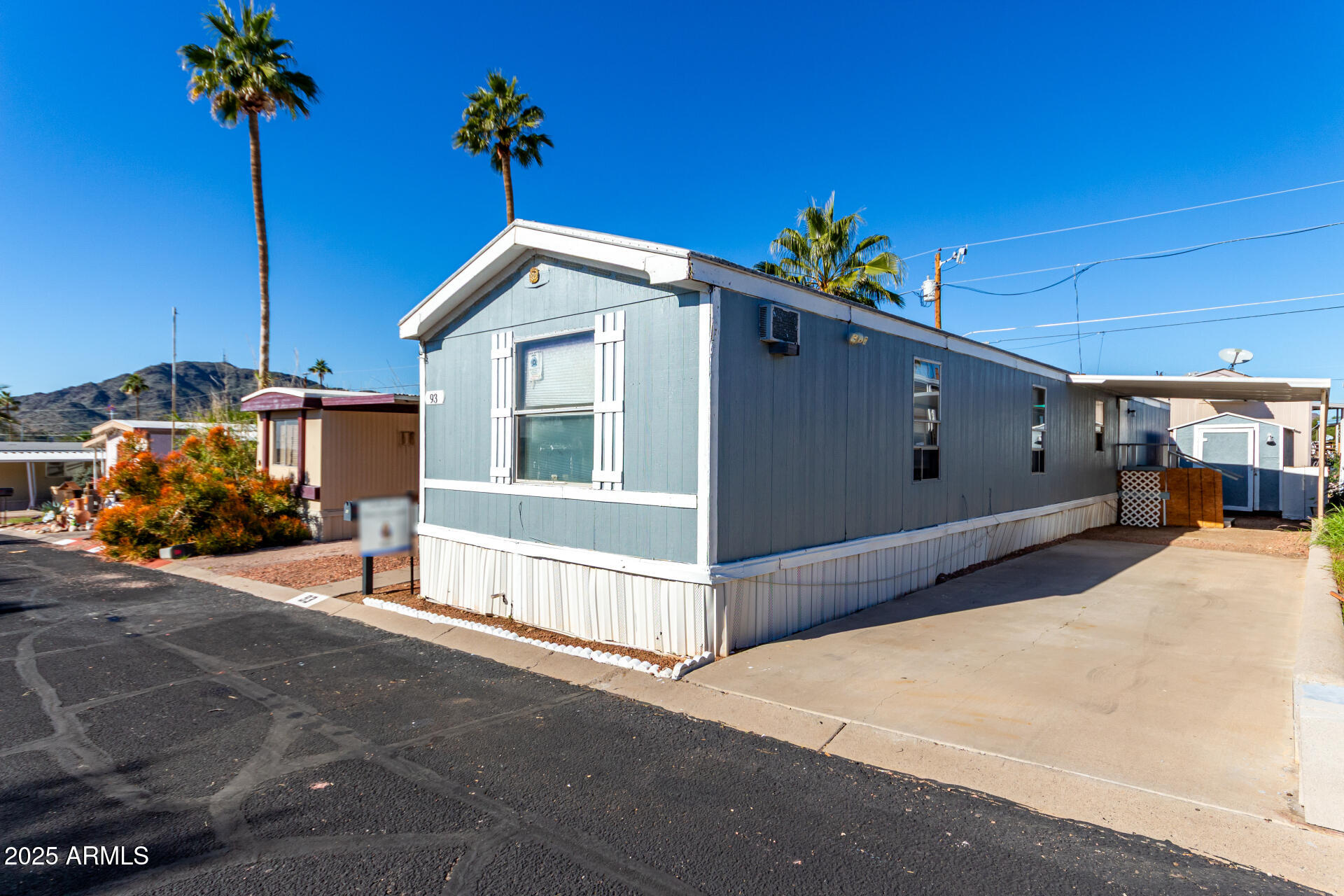 10401 North Cave Creek Road, Unit 93 Phoenix, AZ 85020 - Photo 28 of 28 a view of a house with a garage