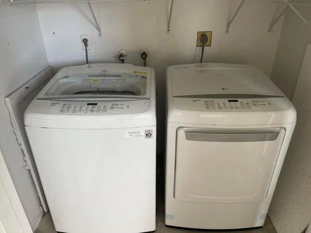a utility room with dryer and washer