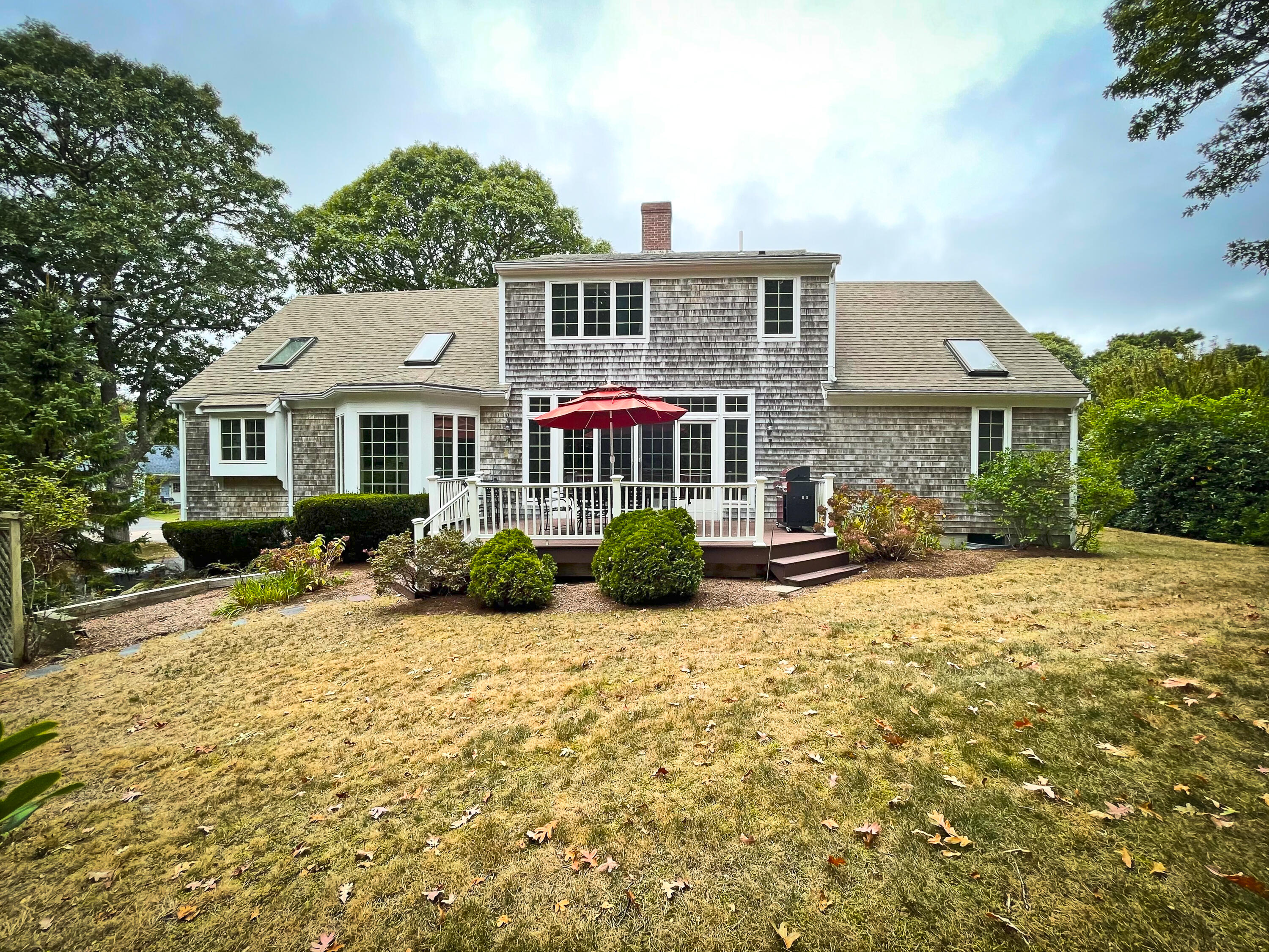 7 Captain Scott Road Harwich, MA 02645 - Photo 11 of 41 front view of a house with a yard