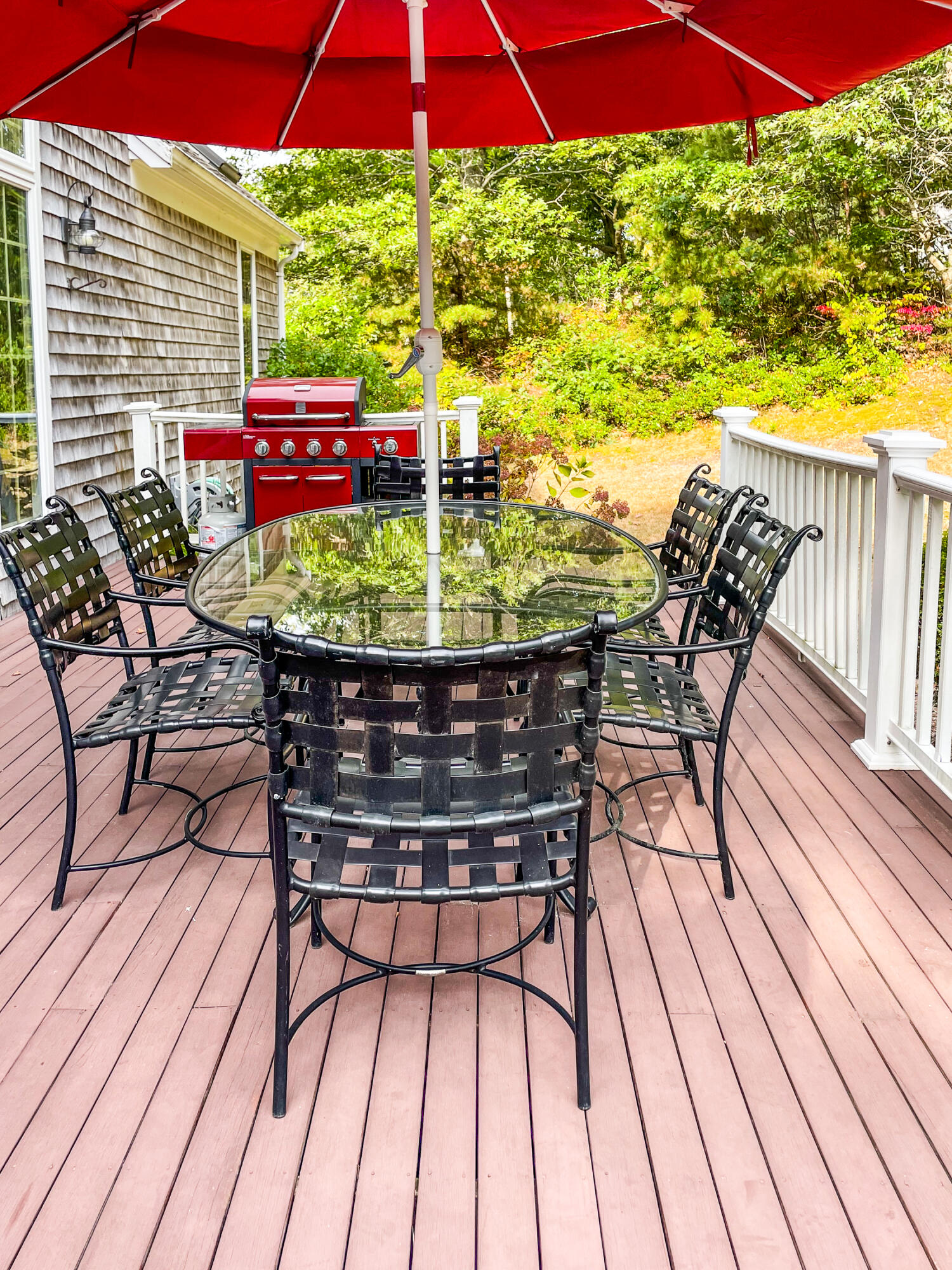 7 Captain Scott Road Harwich, MA 02645 - Photo 12 of 41 a view of a chairs and table in the balcony