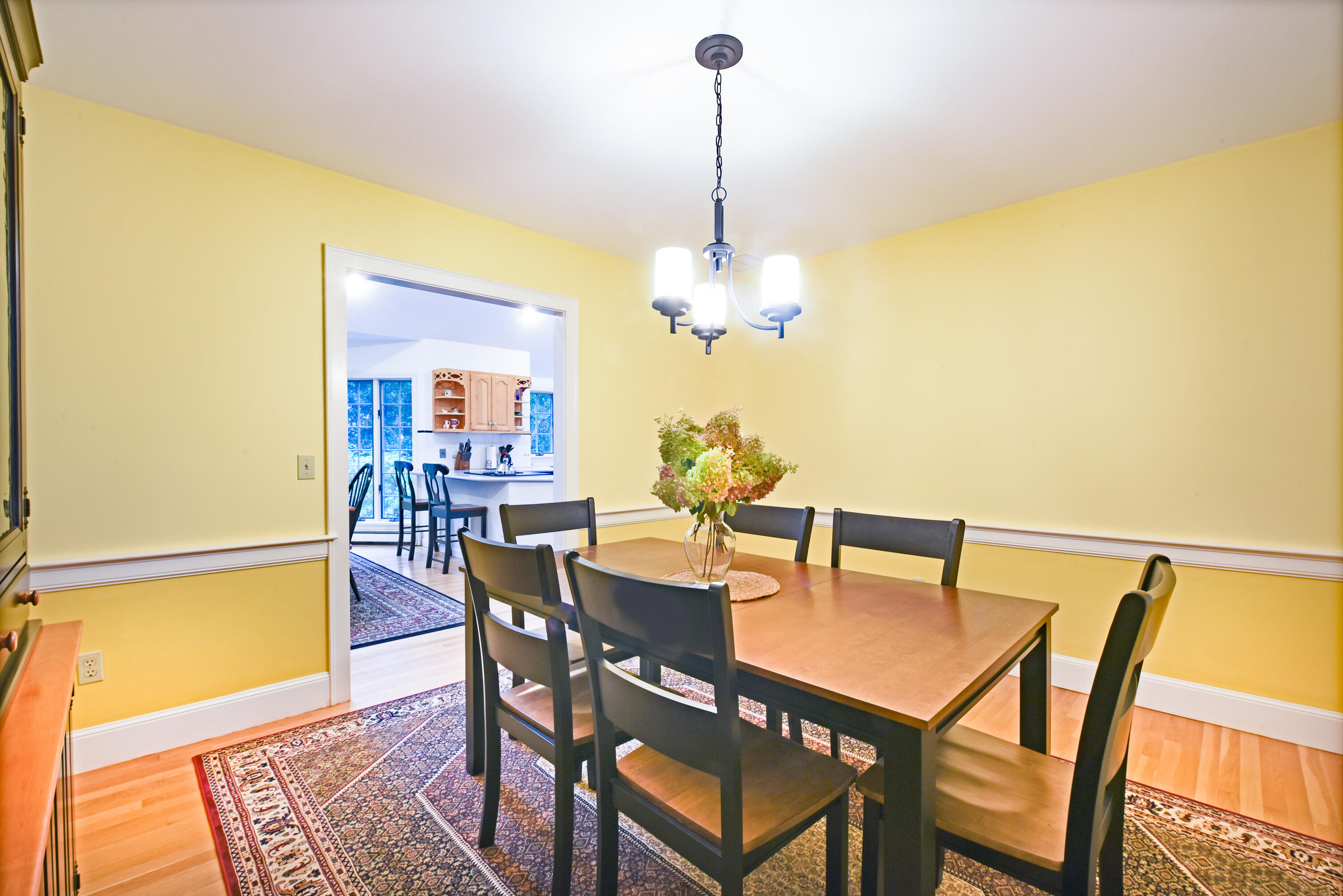 7 Captain Scott Road Harwich, MA 02645 - Photo 25 of 41 a view of a dining room with furniture and wooden floor