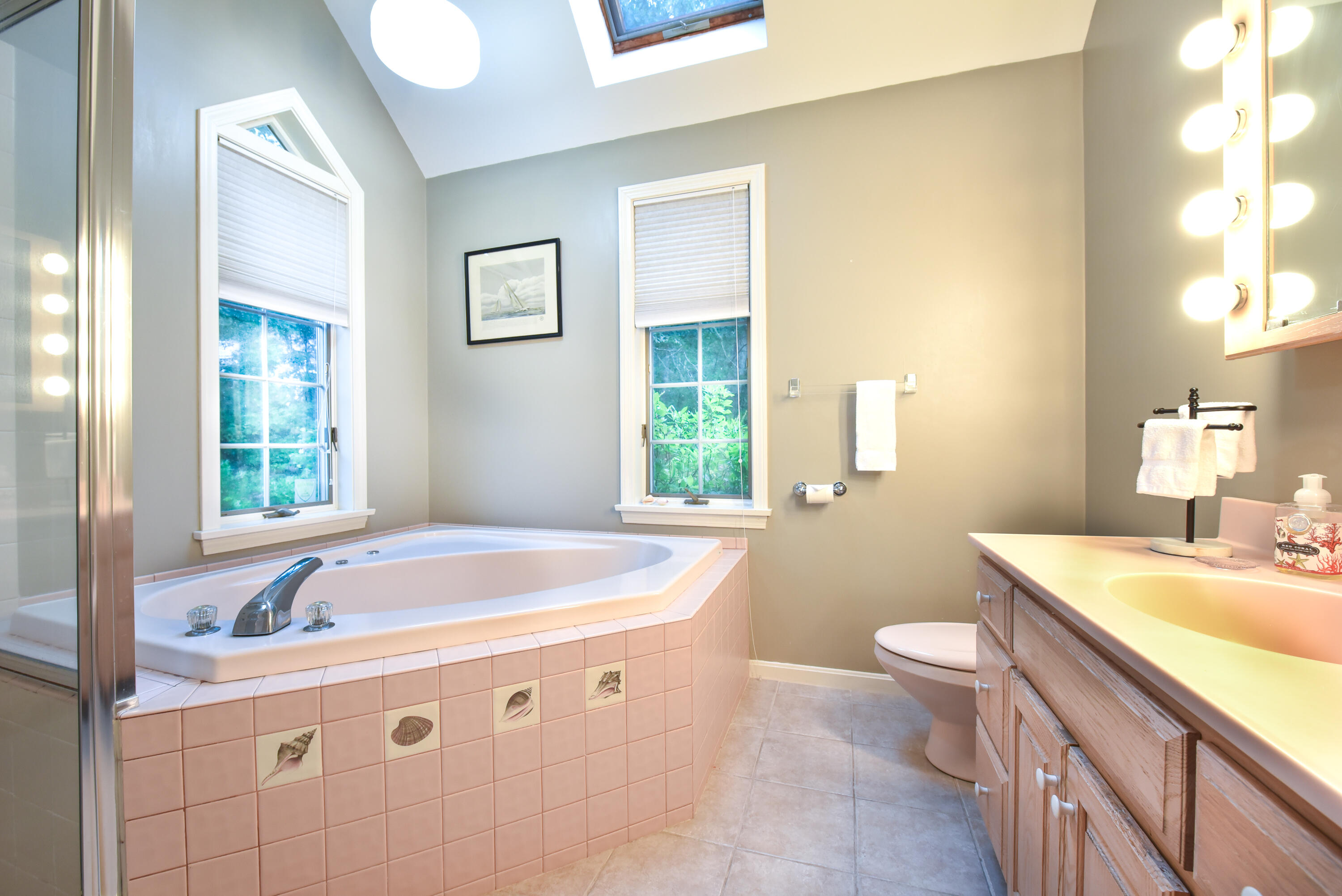 7 Captain Scott Road Harwich, MA 02645 - Photo 31 of 41 a bathroom with a tub sink and mirror