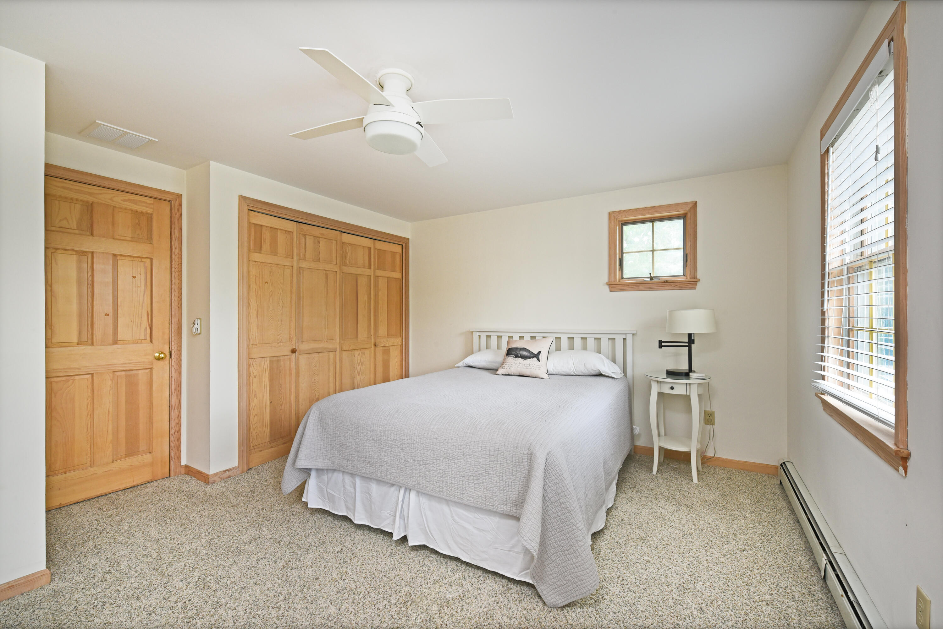 7 Captain Scott Road Harwich, MA 02645 - Photo 36 of 41 a bedroom with a bed and a window