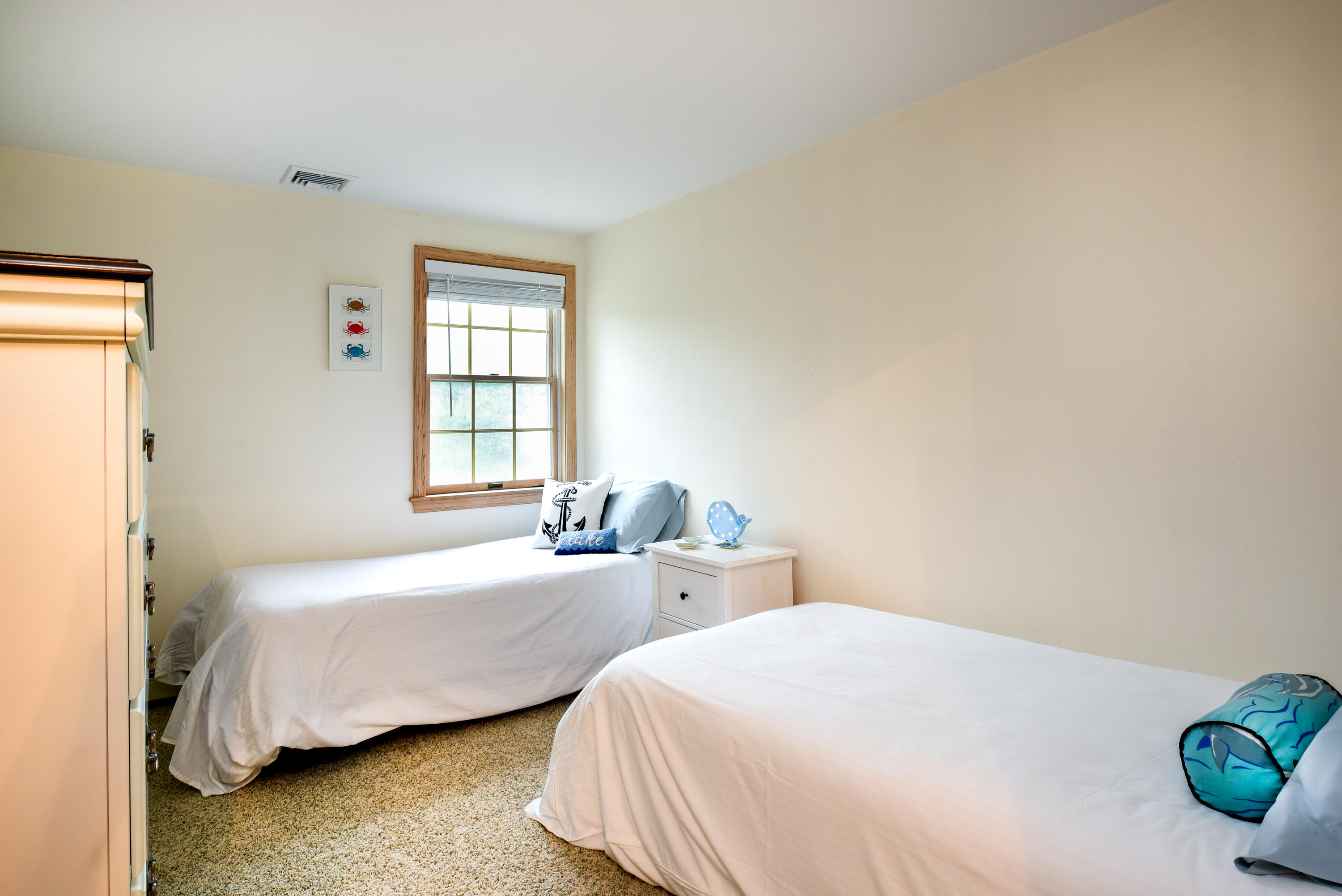 7 Captain Scott Road Harwich, MA 02645 - Photo 37 of 41 a bedroom with two beds and a window