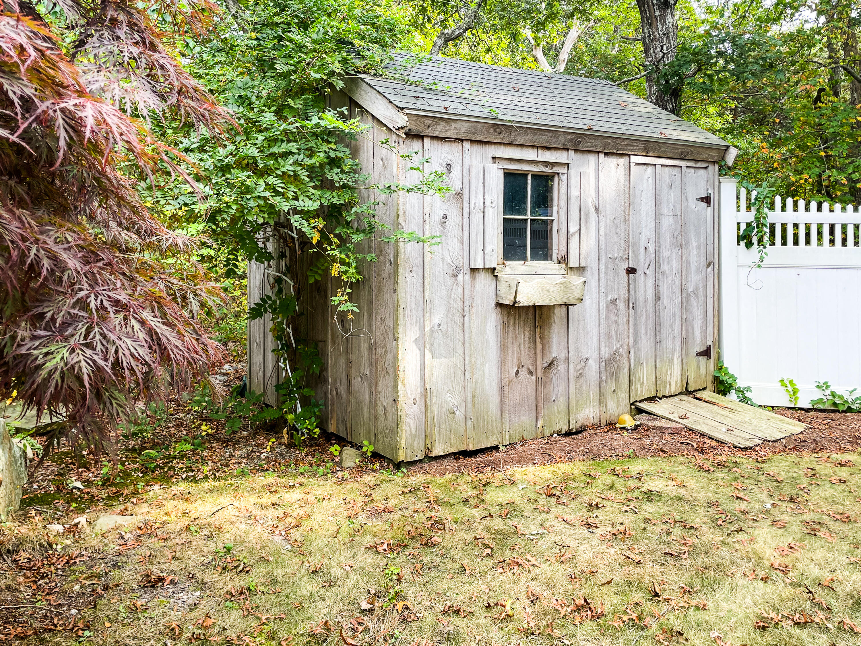 7 Captain Scott Road Harwich, MA 02645 - Photo 41 of 41 a view of a house with a yard
