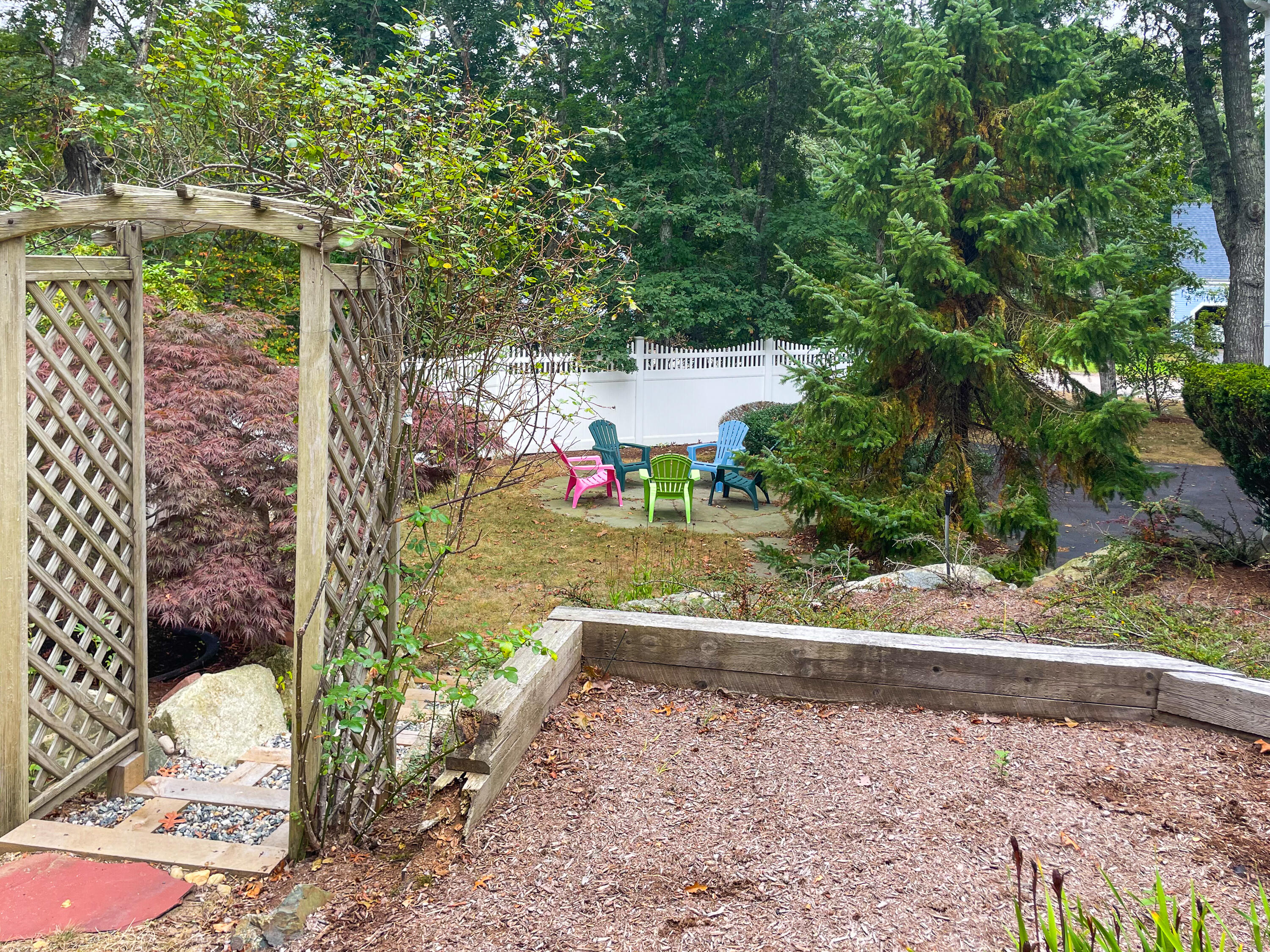 7 Captain Scott Road Harwich, MA 02645 - Photo 9 of 41 a view of a pathway with a yard