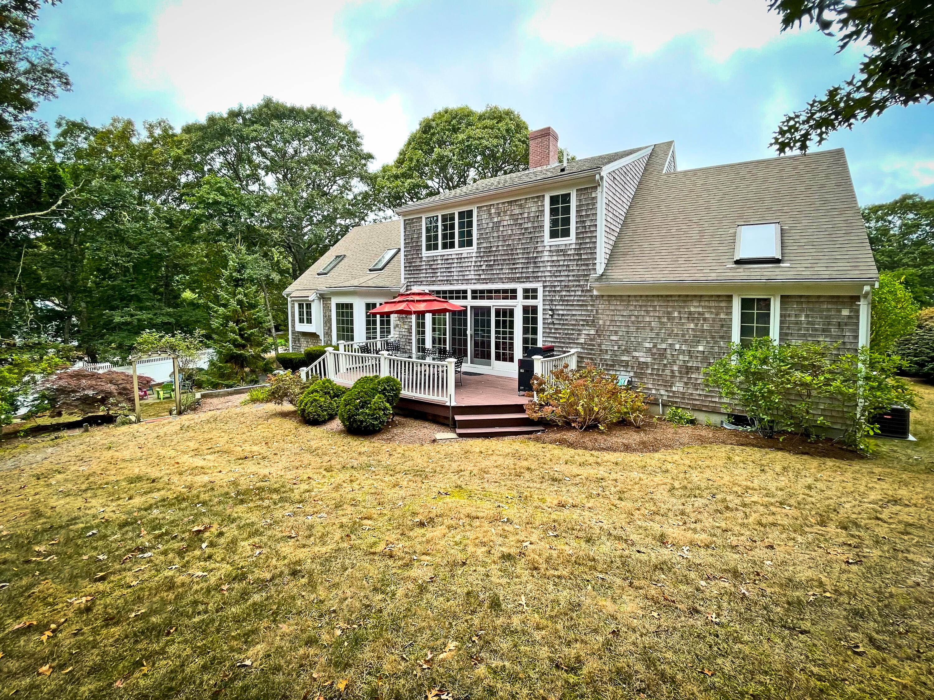 7 Captain Scott Road Harwich, MA 02645 - Photo 10 of 41 front view of a house with a yard