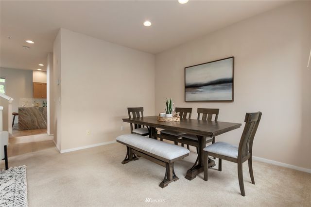 a view of a workspace with furniture