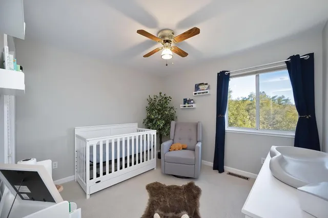 a view of a balcony with wooden floor and outdoor space