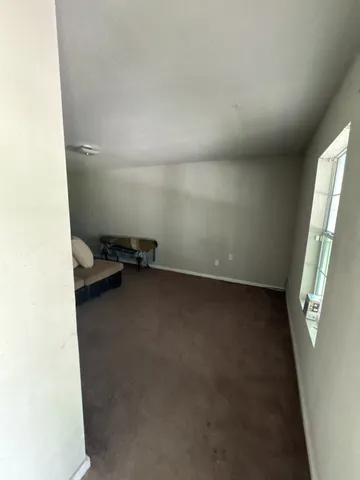 a view of a room with a window