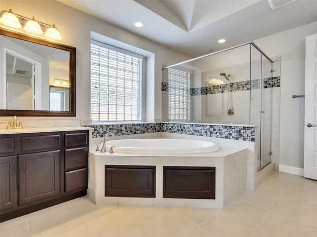 a view of a kitchen with a stove cabinets and a refrigerator