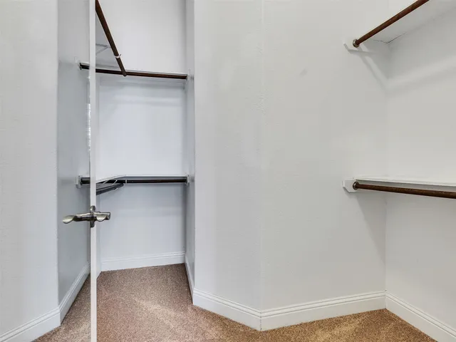 a view of a room with rack on the wall