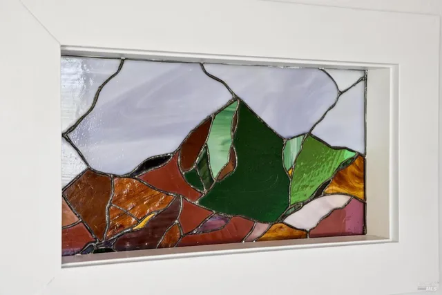 a white toilet sitting next to a bath tub shower