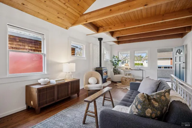 a kitchen that has a sink and a stove