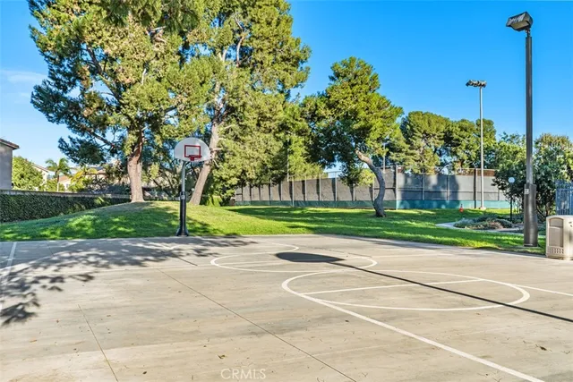 a view of a park with swings and slides