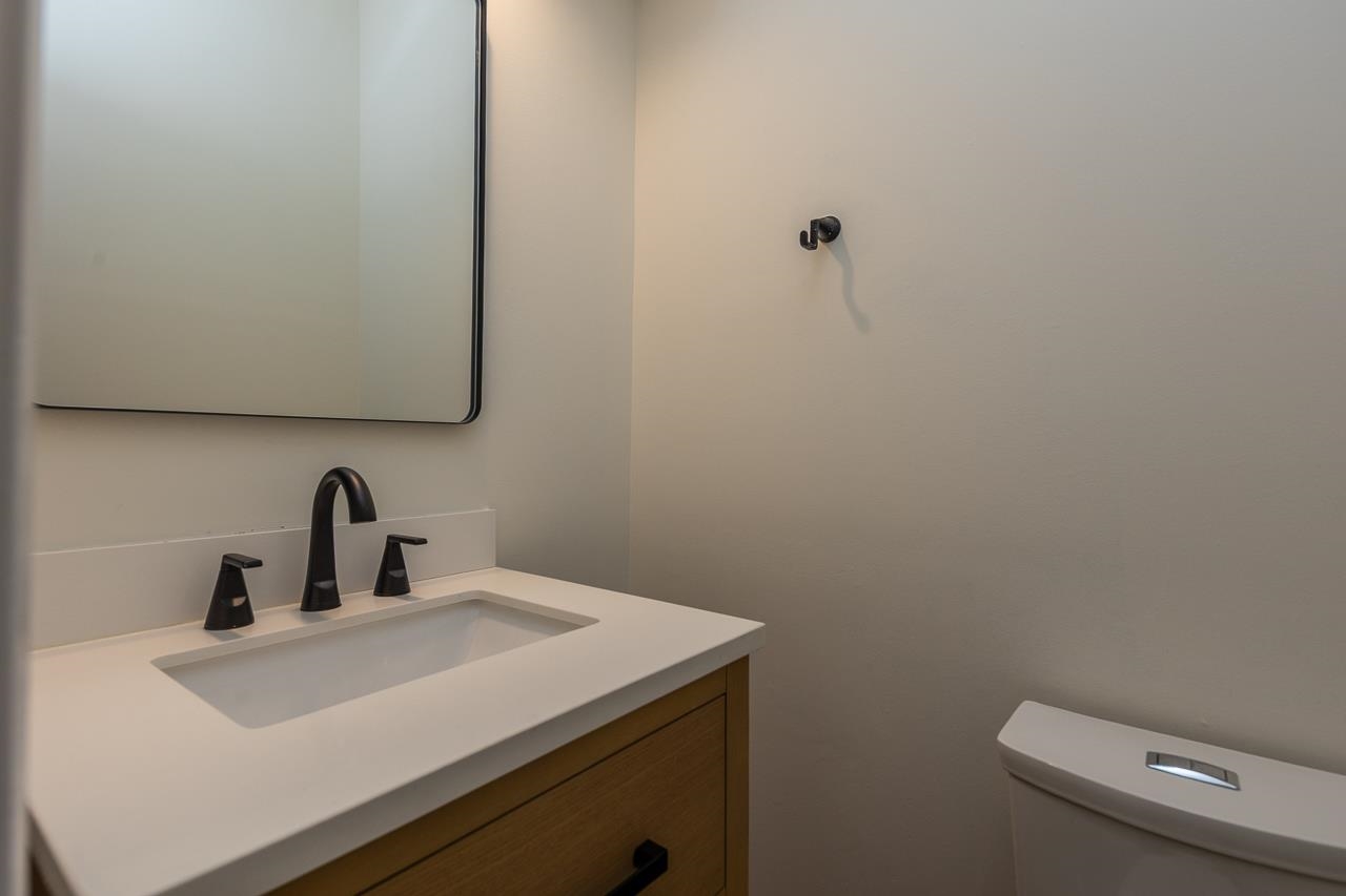 759 West Powell Road Collierville, TN 38017 - Photo 25 of 39 a bathroom with a sink and mirror