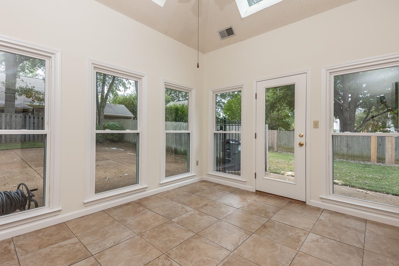 759 West Powell Road Collierville, TN 38017 - Photo 26 of 39 a view of an entryway with wooden floor and door