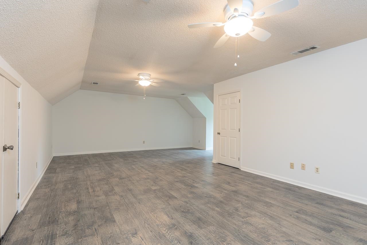 759 West Powell Road Collierville, TN 38017 - Photo 30 of 39 an empty room with a empty space and a ceiling fan