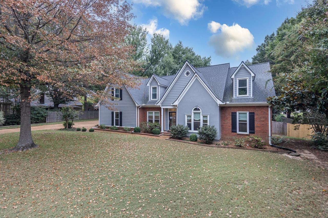 759 West Powell Road Collierville, TN 38017 - Photo 3 of 39 a front view of a house with a yard