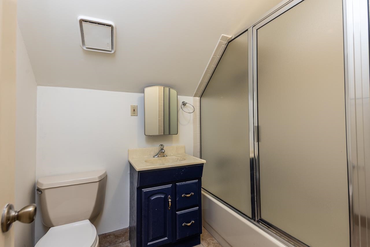 759 West Powell Road Collierville, TN 38017 - Photo 31 of 39 a bathroom with a toilet sink and mirror