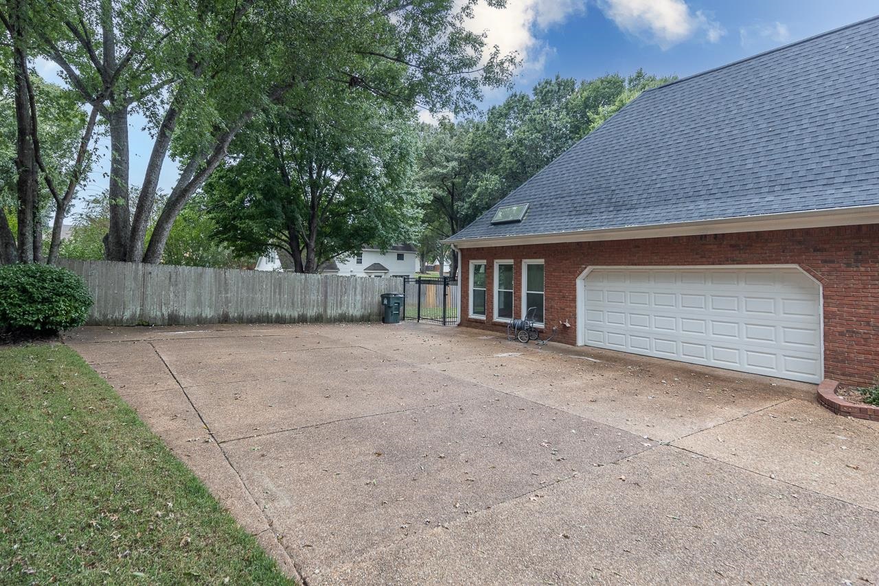 759 West Powell Road Collierville, TN 38017 - Photo 32 of 39 a house with trees in the background