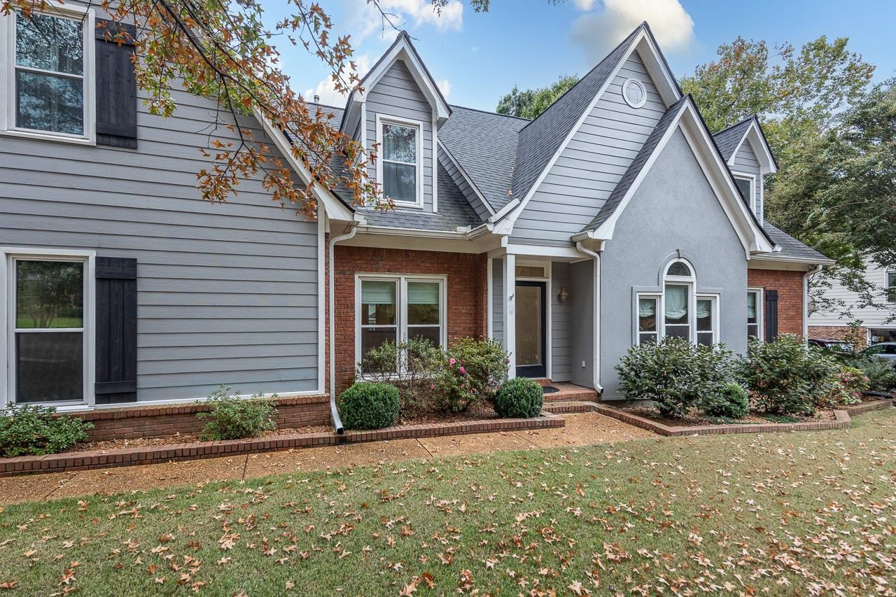759 West Powell Road Collierville, TN 38017 - Photo 4 of 39 a front view of a house with garden